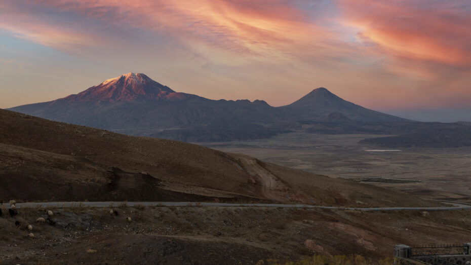 Mount Ararat in the setting sun. This stratovolcano was formed after the flood but has become one of the traditional resting places of Noah's ark. The Bible though says the ark landed in the "mountains" (plural) of Ararat (Urartu). We believe the Durupinar boat formation is a better candidate.
